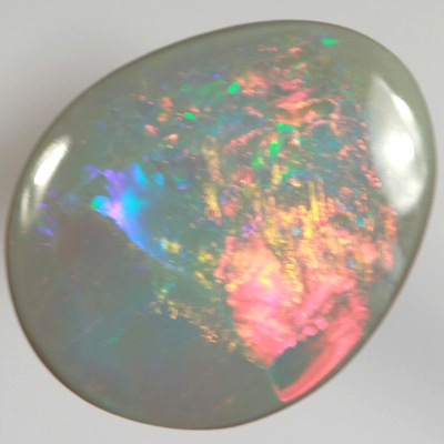 SOLID SEMI BLACK OPAL Bright rolling flashes from red to turquoise and more SEE VIDEO